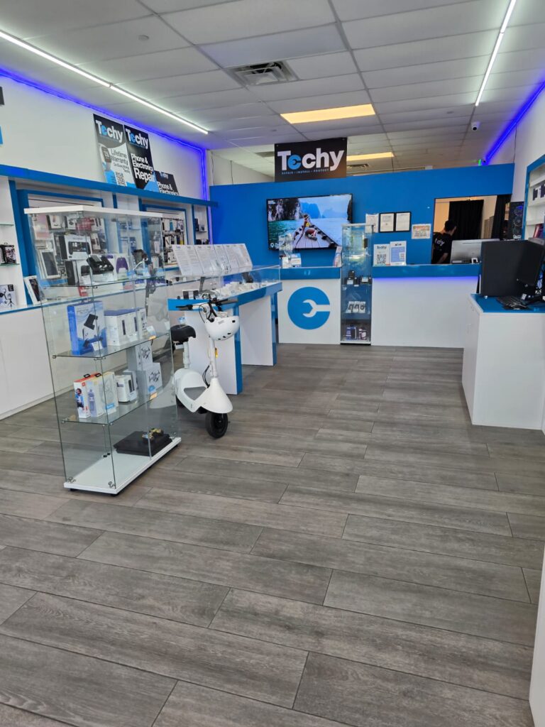 Electric scooters inside Techy Doral repair shop in Sweetwater, FL